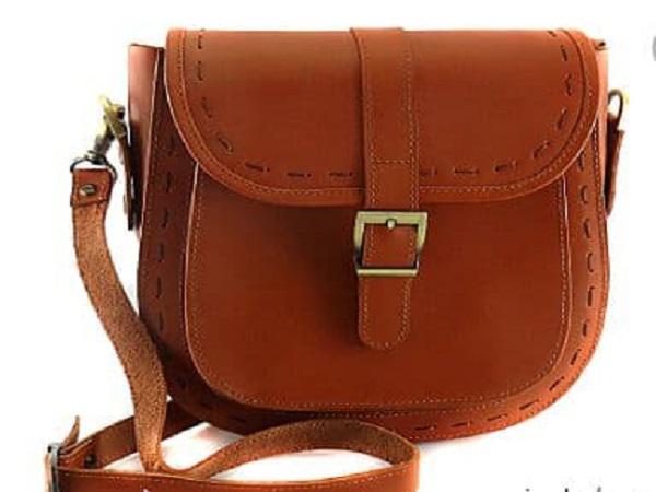 How do you calculate leather shoulder bag size?